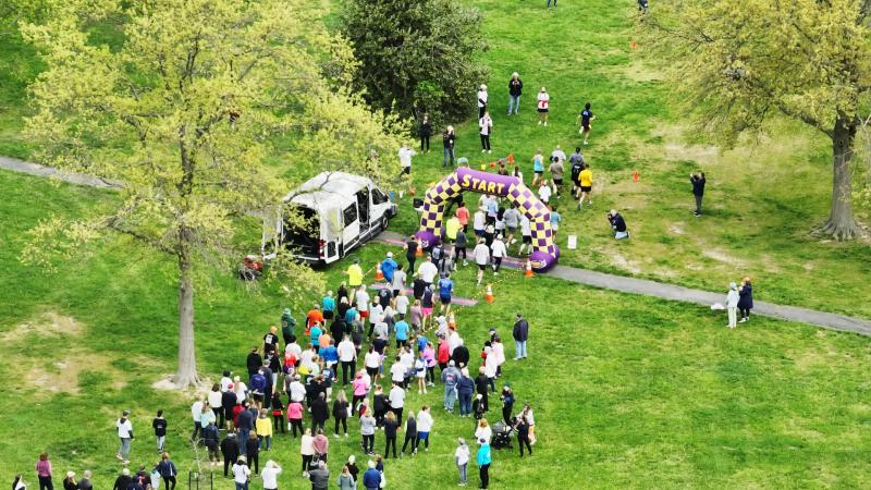 Race for Open Space 2024 runners head through the starting gate in George H.P. Smith Park, Lewes. SUBMITTED PHOTO